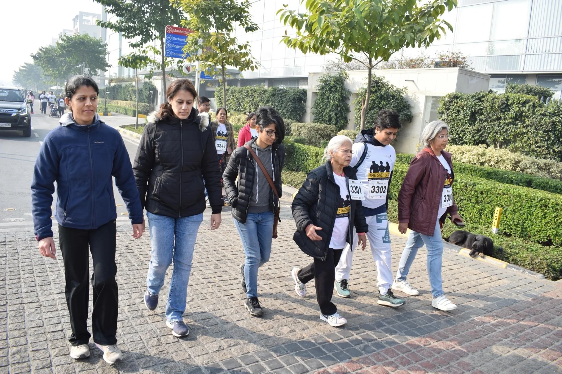 Parents and children walking side by side at Walk With Your Parents